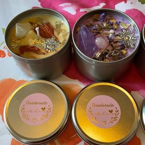 Reiki infused candles with crystals charms and a special gift inside !!